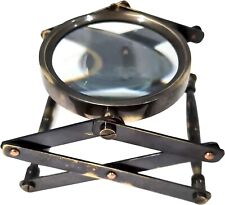 This antique brass magnifying glass is a unique and exquisite desktop collectib picture