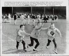 1965 Press Photo Lions Football Coach Ray Renfro's Boys Play as Team Works Out picture