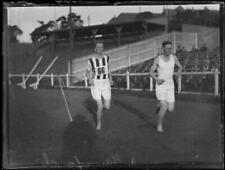 A. Gainsford racing barefoot with another man at an athletic m - 1930s Old Photo picture