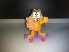 Vintage 1978, 1981 Garfield on Skateboard Holding Pooky Figure-United Feat Sync picture