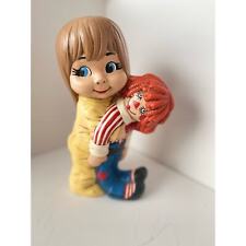Rare find Little Girl figurine with rag doll. 9 1/4” tall picture