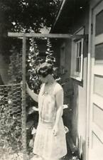 PS24 Vtg Photo YOUNG LADY DRESSED UP BY THE CHICKEN WIRE FENCE, GARDEN c 1920's picture