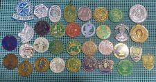 34 different plastic medallions from Mardi Gras beads - many shapes and krewes picture