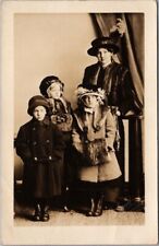 Vintage1910s Studio RPPC Photo Postcard Mother & Three Children in Winter Coats picture