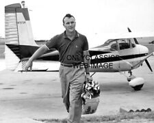 PILOT GOLFER ARNOLD PALMER 8X10 PHOTO FLIES HIS 1958 CESSNA 175 SKYLARK AIRPLANE picture