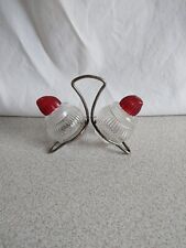VINTAGE SMALL RIBBED GLASS RED LIDS SALT PEPPER SHAKERS ON WIRE STAND picture
