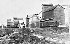 Railroad Train Grain Elevators Gothenburg Nebraska NE Reprint Postcard picture