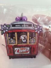 NEW RARE RAISING CANE'S CHICKEN MARDI GRAS PURPLE BEADS W/DOG CROWN CABLE CAR  picture