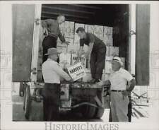 1964 Press Photo Sheriff Roy Baker & agents inspect confiscated liquor, Florida picture