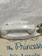the princess telephone key chain with advertising card picture