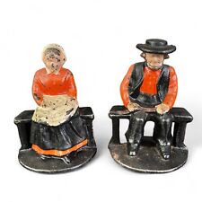 Antique Heavy Cast Iron Amish Couple Doorstop Bookends picture