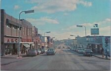1960s SISSETON, South Dakota Postcard MAIN STREET Downtown Scene / Stores Cars picture