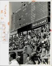 1983 Press Photo Baseball Fans Under Scoreboard At Wrigley Field In Chicago picture