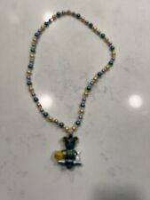 2004 New Orleans Hornets ￼mardi gras beads picture