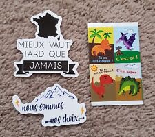Lot Of 3 French Stickers Foreign Language France Sayings Dinosaur Mountain  picture