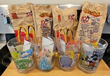 DISNEY / MCDONALDS 100th Anniversary Set Of 4 Drinking Glasses VTG With Bags picture