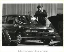1993 Press Photo James Gaunt of Appleway Chevrolet Wipes Geo for Car Show picture