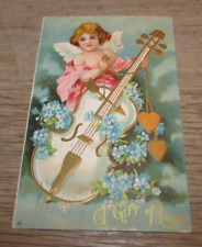 Antique 1907 Embossed Valentine’s Day Postcard Cupid w/ Cello International Art picture