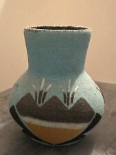 Small Native American Pottery Vase. Signed LM.  picture