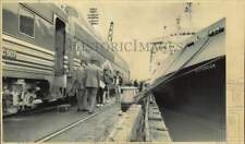 1989 Press Photo Train stopped along dock next to Rotterdam cruise ship, Alaska picture