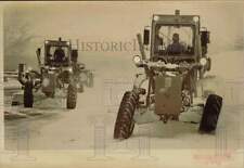 1984 Press Photo Tractors clearing snow from airport runway in Alaska picture
