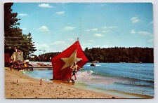 c1960s-70s~Tommy Bartlett Ski Show~Man Flying Kite~Wisconsin Dells WI~Postcard picture