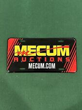MECUM AUCTIONS ALUMINUM LICENSE PLATE BOOSTER TAG EMBOSSED. picture