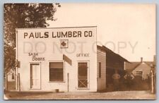 RPPC Sigourney Iowa Postcard Pauls Lumber Co Store Front Washington IA Schultz picture