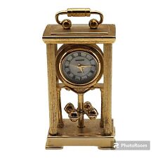 Shannons Goldtone Minature Spinning Mantle Clock Collectable picture