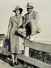 2i Photograph 1929 *Damaged*  Handsome Man Standing On Fence Fedora Woman  picture