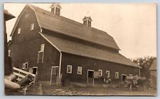 People in Old Car and Man on Horseback in front of Barn - RPPC picture