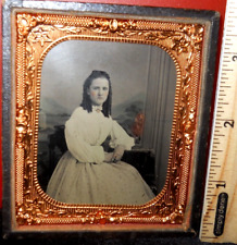 1/6th size tinted Tintype of pretty young lady in half case picture