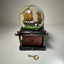 Disney Snow Globe Pirates of the Caribbean At World's End W/Key Lights Up Music picture