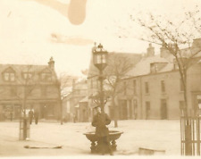 Vintage Real Photo Postcard RPPC Town in Winter Smiling Man Street Lamp Snow picture