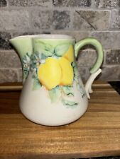 Porcelain pitcher with hand painted lemons and greenery 5 inches tall picture