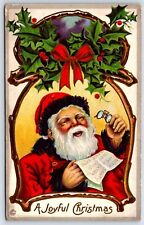 Postcard Santa Claus Reading Letter Wish List Holly Joyful Christmas c1920s S31 picture