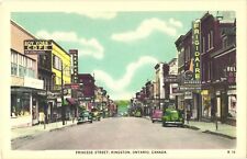 View of Shops And Cars Along Princess Street Kingston, Ontario, Canada Postcard picture
