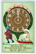 c1910's New Year Children Sled Handwarmer Giant Clock Embossed Antique Postcard picture