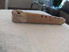 pre columbian small musical instrument two tone beige snake wrap on end. picture