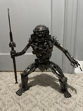 Heavy Rotating Predator Metal Sculpture With Spear. Scrap Metal Artwork picture