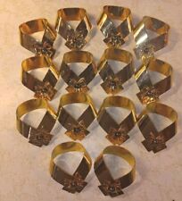 Set Of 14 Vintage Brass Colored Napkin Holders With Flower Curved Ribbon Design  picture