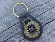 GM THE MARK OF EXCELLENCE NOS Leather Key Fob Antique Gold Medallion Hi-Quality picture