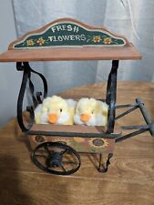 Springtime Delight: Adorable Easter Chicks in a Flower Wagon picture