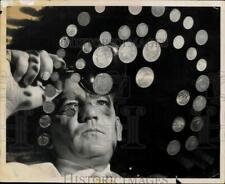 1964 Press Photo Prosper A. Fagnant, Numismatist, takes a close look at coins picture