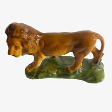 Vintage Majestic Ceramic Lion Figurine Standing in the Green Grass picture