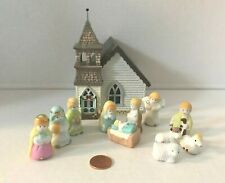 HAND PAINTED 11 PIECE PORCELAIN NATIVITY SET WITH A COUNTRY  CHURCH picture