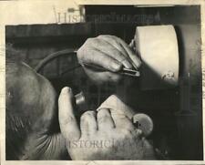 1942 Press Photo John McLachlan studies polished diamond under magnifying glass picture