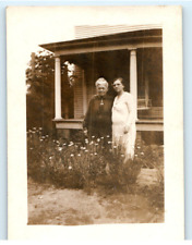 Vintage Photo 1928, 2 older ladies proudly standing next to flowers, 3.5 x 2.5 picture