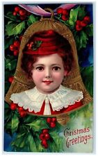 c1910's Christmas Greetings Cute Girl Giant Bell Holly Berries Embossed Postcard picture