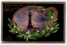 c1910's New Year Greetings Lighthouse Holly Moon Gel Gold Gilt Embossed Postcard picture